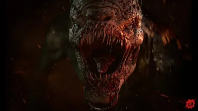 A grotesque pale Locust monster lunges at the camera with needle-filled jaws lit by embers