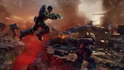 A COG soldier leaps a glowing red fissure with a chainsaw Lancer as a Locust fires back across the smoke